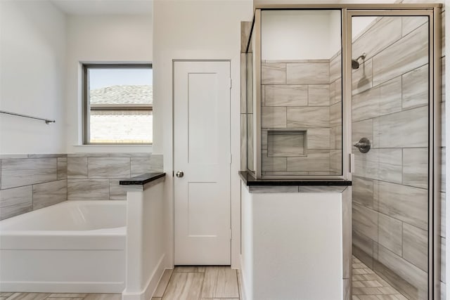 bathroom with independent shower and bath