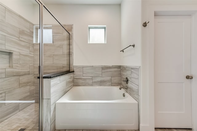 bathroom with plus walk in shower