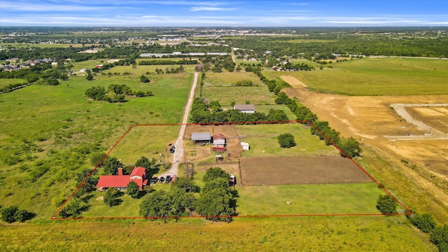 birds eye view of property featuring a rural view