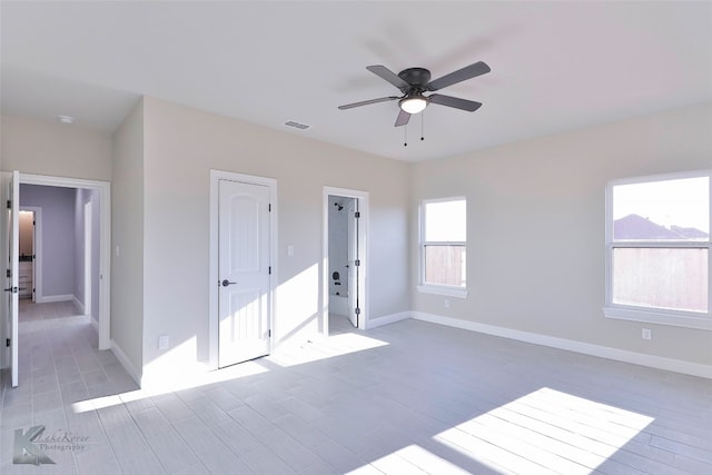 unfurnished bedroom featuring ceiling fan