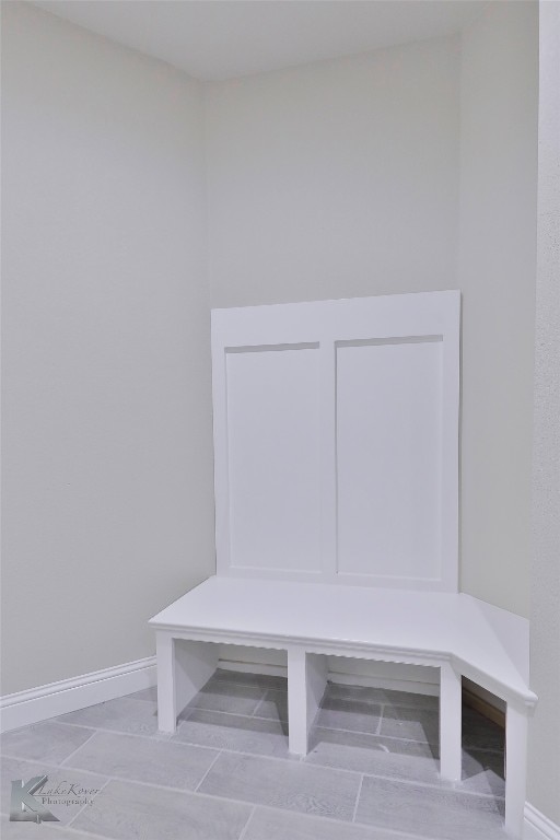 mudroom featuring light tile patterned floors