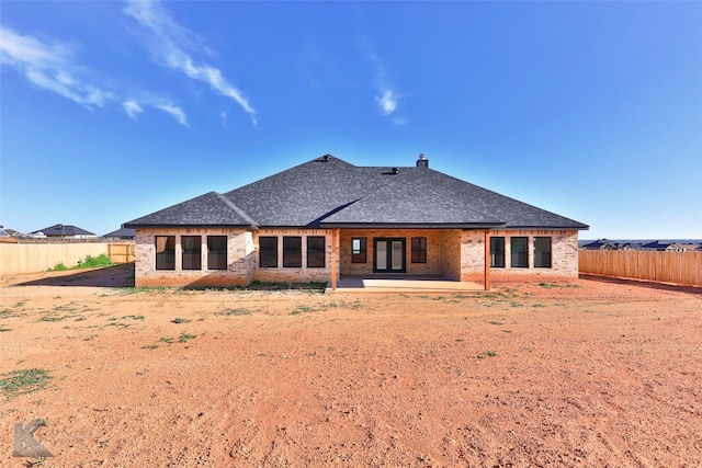 back of house with a patio area