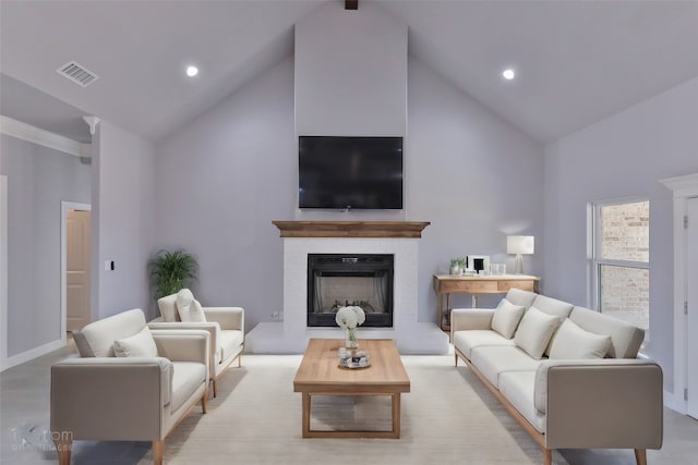 living room with high vaulted ceiling