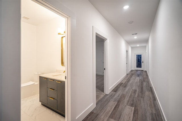 hall featuring hardwood / wood-style flooring