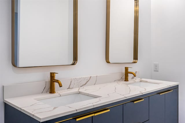 bathroom with dual bowl vanity