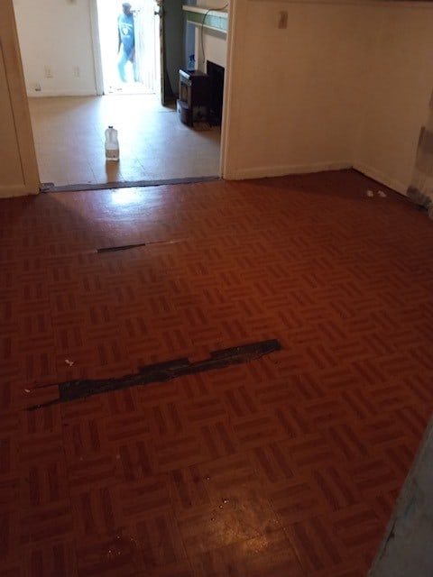 empty room featuring dark parquet floors