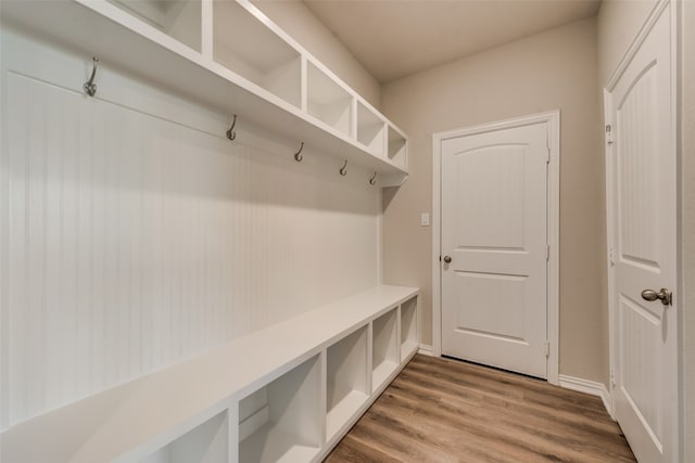 mudroom with hardwood / wood-style flooring