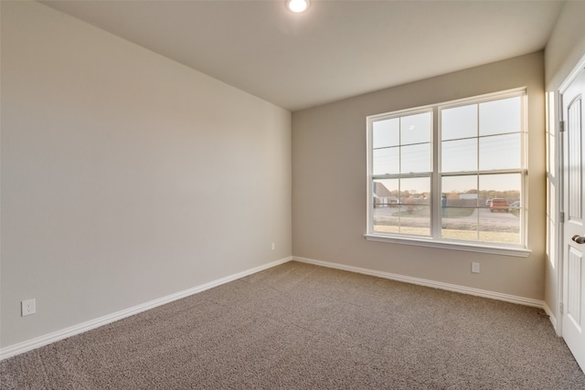 view of carpeted spare room