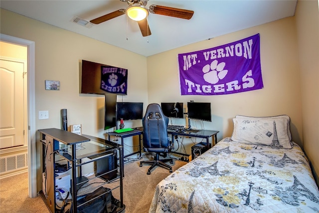 bedroom featuring ceiling fan and light colored carpet