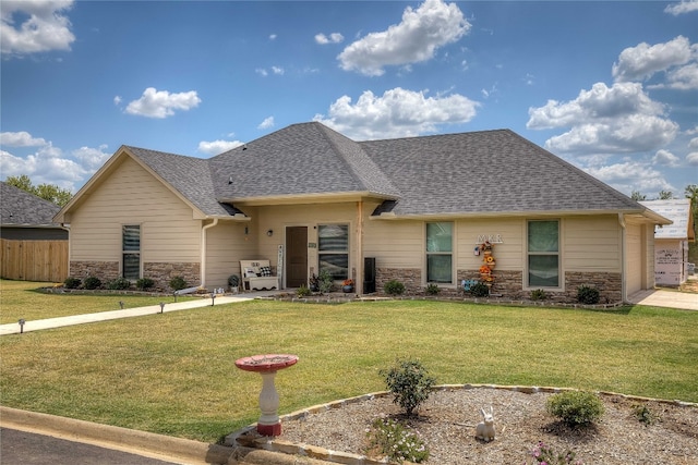 ranch-style house with a front lawn