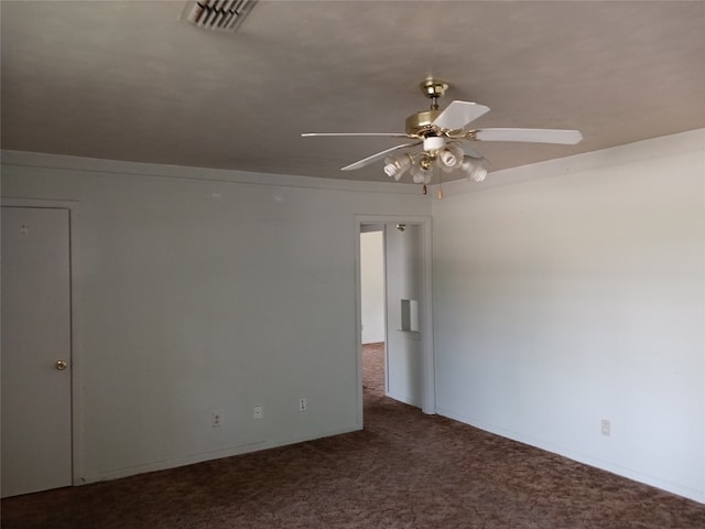 carpeted empty room with ceiling fan