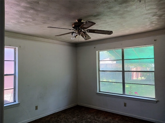 empty room featuring ceiling fan