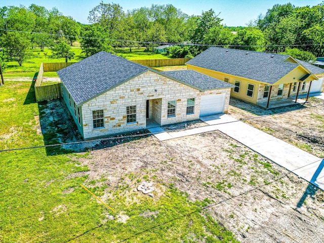 view of front of property featuring a front lawn and a patio area