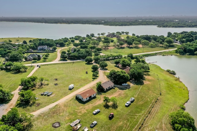 aerial view featuring a rural view and a water view