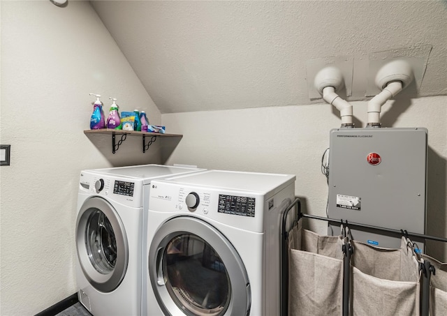 washroom with washing machine and dryer