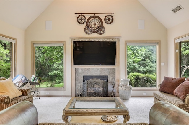 living room featuring carpet flooring and plenty of natural light