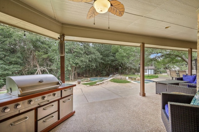 view of patio / terrace featuring ceiling fan