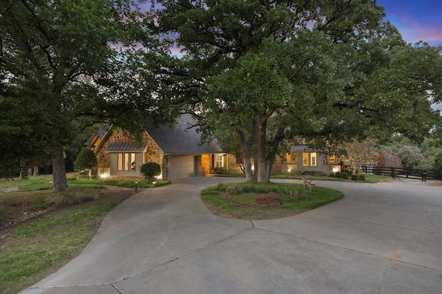 view of front of property with a garage