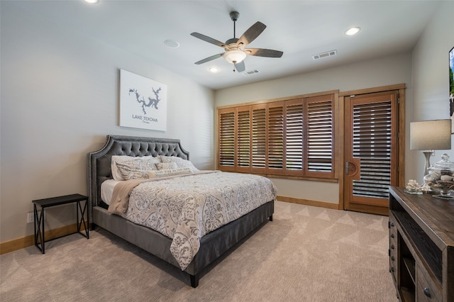 carpeted bedroom with ceiling fan