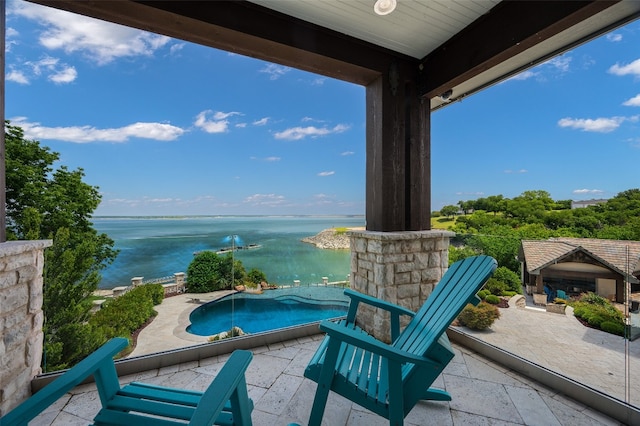 view of patio / terrace featuring a water view