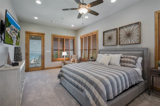 bedroom featuring light colored carpet, access to outside, and ceiling fan