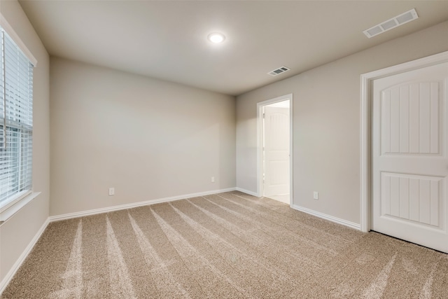 unfurnished bedroom with carpet floors