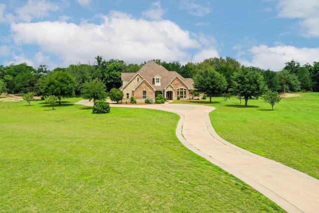 view of front facade with a front lawn