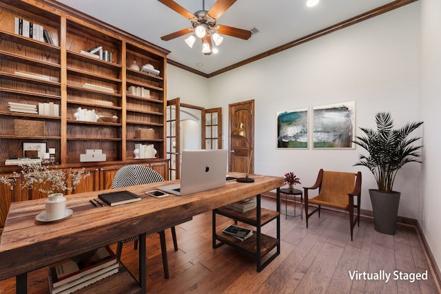 office area with ceiling fan, crown molding, and dark hardwood / wood-style floors