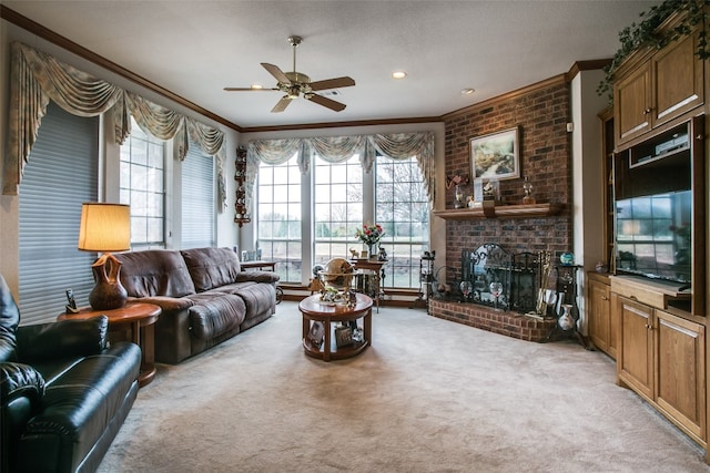 living room with light carpet, a brick fireplace, crown molding, and ceiling fan