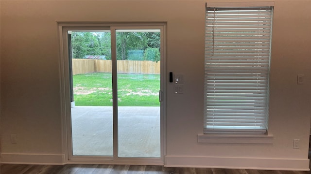 entryway with wood-type flooring