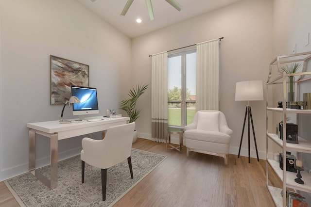 office space featuring ceiling fan and wood-type flooring