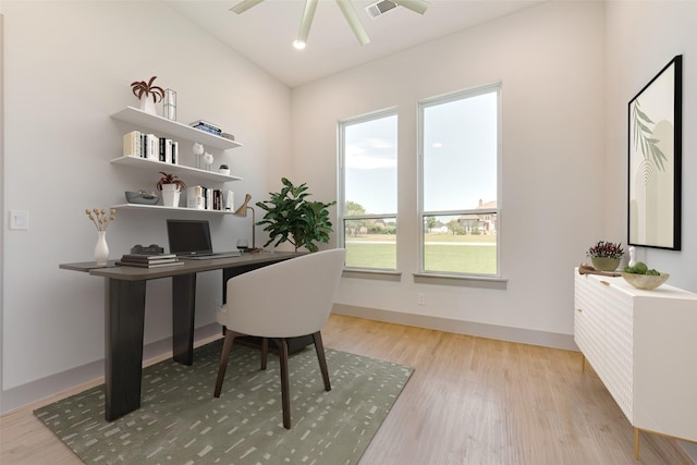 home office with light wood-type flooring