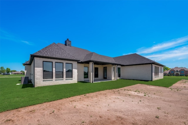 back of house with a yard, a patio, and cooling unit