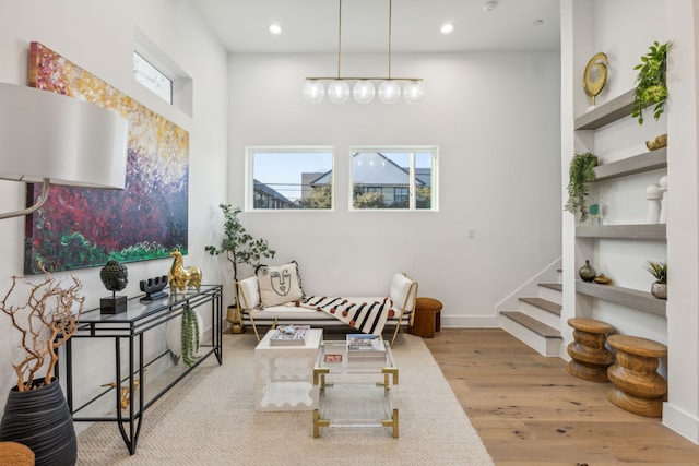 living area with light hardwood / wood-style flooring