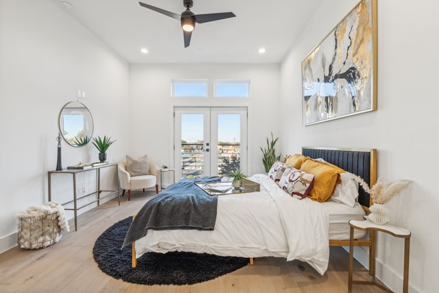 bedroom featuring hardwood / wood-style floors, ceiling fan, access to exterior, and french doors