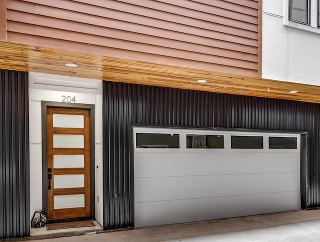 property entrance with a garage