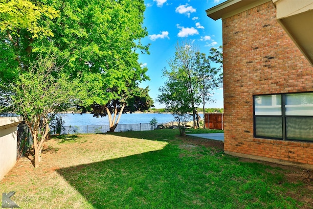 view of yard with a water view