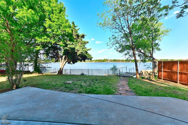 view of patio / terrace with a water view