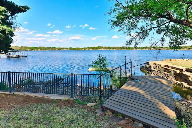 dock area featuring a water view