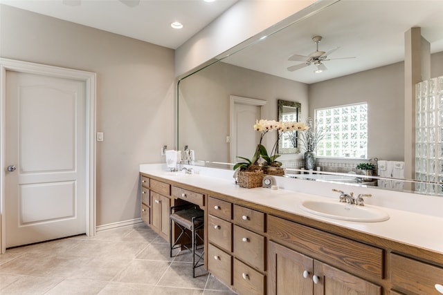 bathroom with vanity, ceiling fan, and tile patterned floors