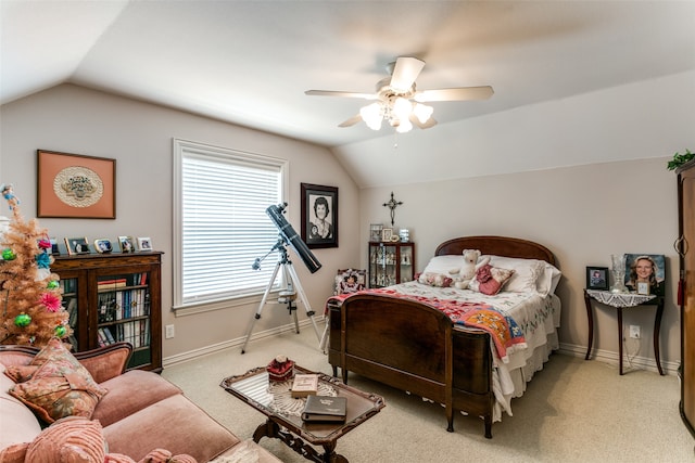 carpeted bedroom with lofted ceiling and ceiling fan