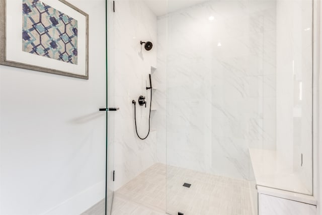 bathroom featuring an enclosed shower