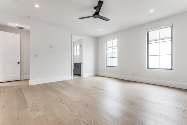 interior space with ceiling fan and light hardwood / wood-style flooring