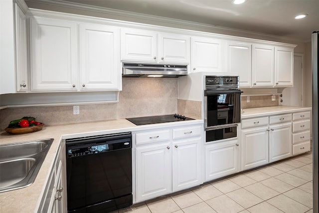 kitchen featuring black appliances, white cabinetry, light tile patterned floors, and crown molding