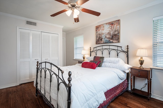 bedroom with multiple windows, crown molding, dark hardwood / wood-style floors, and ceiling fan