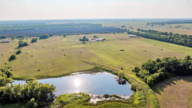 drone / aerial view with a rural view and a water view