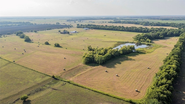 aerial view featuring a water view and a rural view