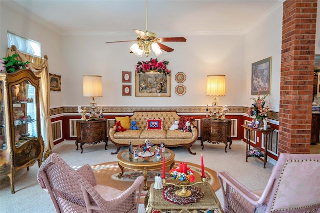 living room featuring brick wall, ornamental molding, light colored carpet, and ceiling fan