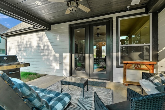 view of terrace featuring a grill, ceiling fan, outdoor lounge area, and french doors