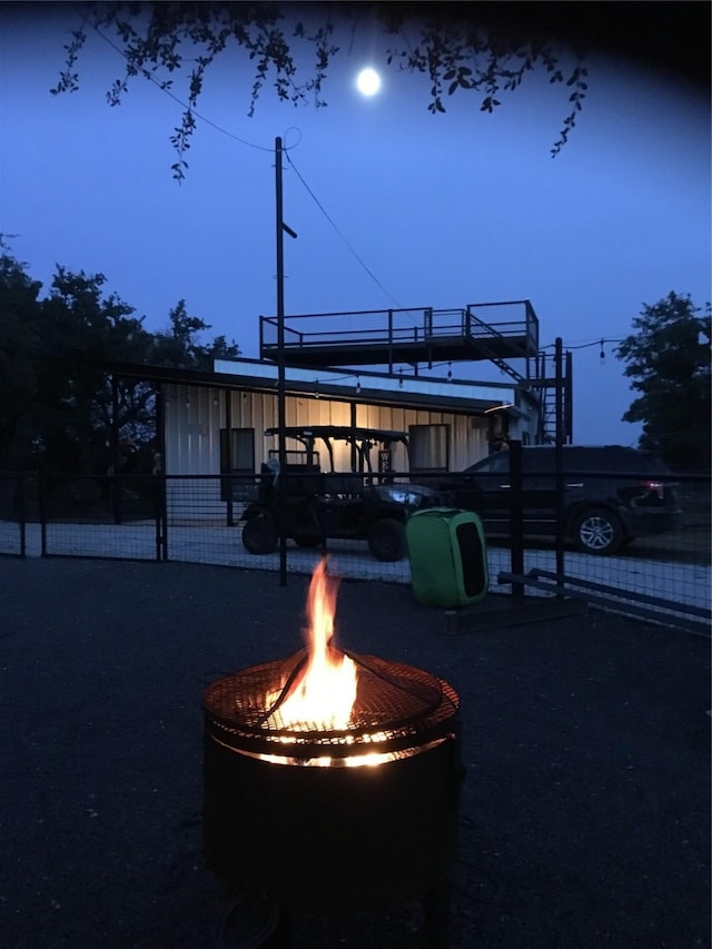 exterior space with an outdoor fire pit